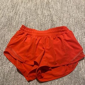 hotty hot lululemon shorts size 6 and 2.5" in the color in carnation red